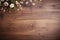 Antique wooden country table with flowers and floral design, wood texture and rustic flatlay background