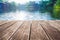 Antique wooden pier on the lake with sunlight effects