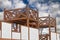 Antique wooden watchtower against sky