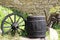 Antique wooden wheel and barrel in rural part of the country