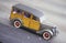 An antique Woody wagon crosses the Golden Gate Bridge in San Francisco, CA