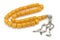 Antique yellow bakelite prayer beads isolated on white