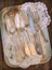 Antiques - cutlery, spoons, forks, knives on a tray
