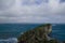 Antrim Coast with blue cloudy sky at Kinbane Castle,