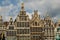 Antwerp, Flanders, Belgium. August 2019. On a beautiful sunny day detail of the facades of the guild houses in the town hall