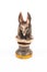 Anubis figurine on a white background