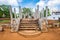 Anuradhapura, guardian statue at Thuparama Dagoba in the Mahavihara Cultural Triangle of Sri Lanka