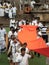 ANURADHAPURA, SRI LANKA - March 9, 2019: Pilgrims carry long new orange cloth