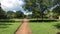 Anuradhapura, Sri Lanka, sandy track through grass