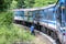 The Anuradhapura to Jaffna train rounds a bend north of Anuradhapura in Sri Lanka.