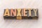 Anxiety word abstract in wood type