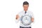 Anxious businessman holding and looking at clock