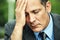 Anxious Colombian Business Man Wearing Suit And Tie