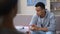 Anxious drug addicted black teenager suffering withdrawal, psychotherapy session