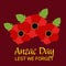 Anzac Day with poppies and text Lest we forget.