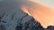 Aoraki, Mount Cook peak with mist forming over mountain peak on sunrise