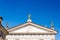 AOSTA, ITALY-JUNE 17,2019:detail of the roof of the cathedral of aosta with the statue of santa maria assunta