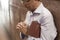 Aparecida, SÃ£o Paulo, Brazil - January 13, 2016: Faithful man prays at Cathedral of Nossa Senhora Aparecida