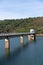 Apartadura dam nature landscape with reflection on the still water in Sao Mamede, Alentejo, Portugal