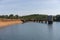 Apartadura dam nature landscape with reflection on the still water in Sao Mamede, Alentejo, Portugal