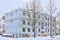 Apartment building along a snow covered street in Tartu