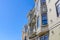 Apartment building with decorative bay window wall ornaments and vents in San Francisco, CA