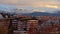 Apartment buildings of Granada suburbs, with Sierra Nevada mountains in evening light