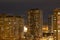 Apartment buildings with lighted windows