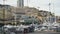 Apartment buildings and yachts docked in harbor, daytime view of Monte Carlo