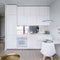 Apartment interior with white kitchenette