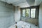 Apartment renovation and construction. Fragment of a room with a window and an insulated ceiling. Preparation for interior