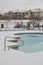 Apartments and swimming pool in the snow