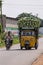 APE threewheeld truck overloaded with cauliflowers in Mysore, In