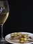 Aperitif white wine olives anchovies food drink glass