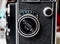Aperture exposure wheel selector detail on vintage retro Rolleiflex photo camera side view