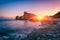 Aphrodite`s Rock beach, Petra tou Romiou, the birthplace of Goddness Aphrodite, Paphos, Cyprus. Amazing sunset seascape