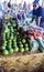 Apia, Samoa - October 27, 2017: Samoan female stall holder at Fugalei fresh produce market with her display of tropical fruit