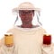 Apiarist with honey glasses