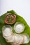 Appam with kadala curry on fresh banana leaf