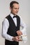 Appealing male waiter proposing coffee