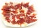 Appetizer of ham thinly sliced