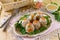 Appetizer Jellied eggs with carrots and green peas, jelly meat on the holiday table