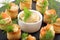 Appetizer puff pastry with dill dip and salmon on stone tray