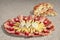 Appetizer Savory Dish Meze And Leavened Pitta Flatbread Torn Loaf Set On Striped Brown Kraft Paper Background