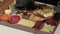 Appetizers boards with assorted cheese, meat, grape and nuts. Charcuterie and cheese platter