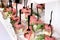 Appetizers canapes with ham meat, melon and arugula on a festive banquet table