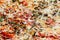 Appetizing background pizza closeup filling the frame