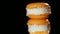 Appetizing baked dessert, sweet orange macaron close-up, confectionery art