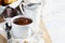 Appetizing breakfast with a delicious cup of thick, drinkable hot chocolate, along with croissants. Homemade look. With copy space