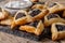 Appetizing buns with poppy seeds. Hamantashen / Hamantash - trad